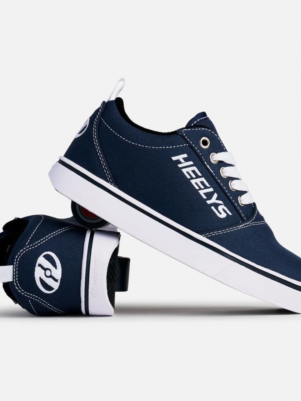 Heelys Pro 20 skate shoes in navy canvas with white laces
